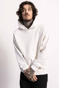 White male model with edgy style wearing a heavyweight cotton off white hoodie