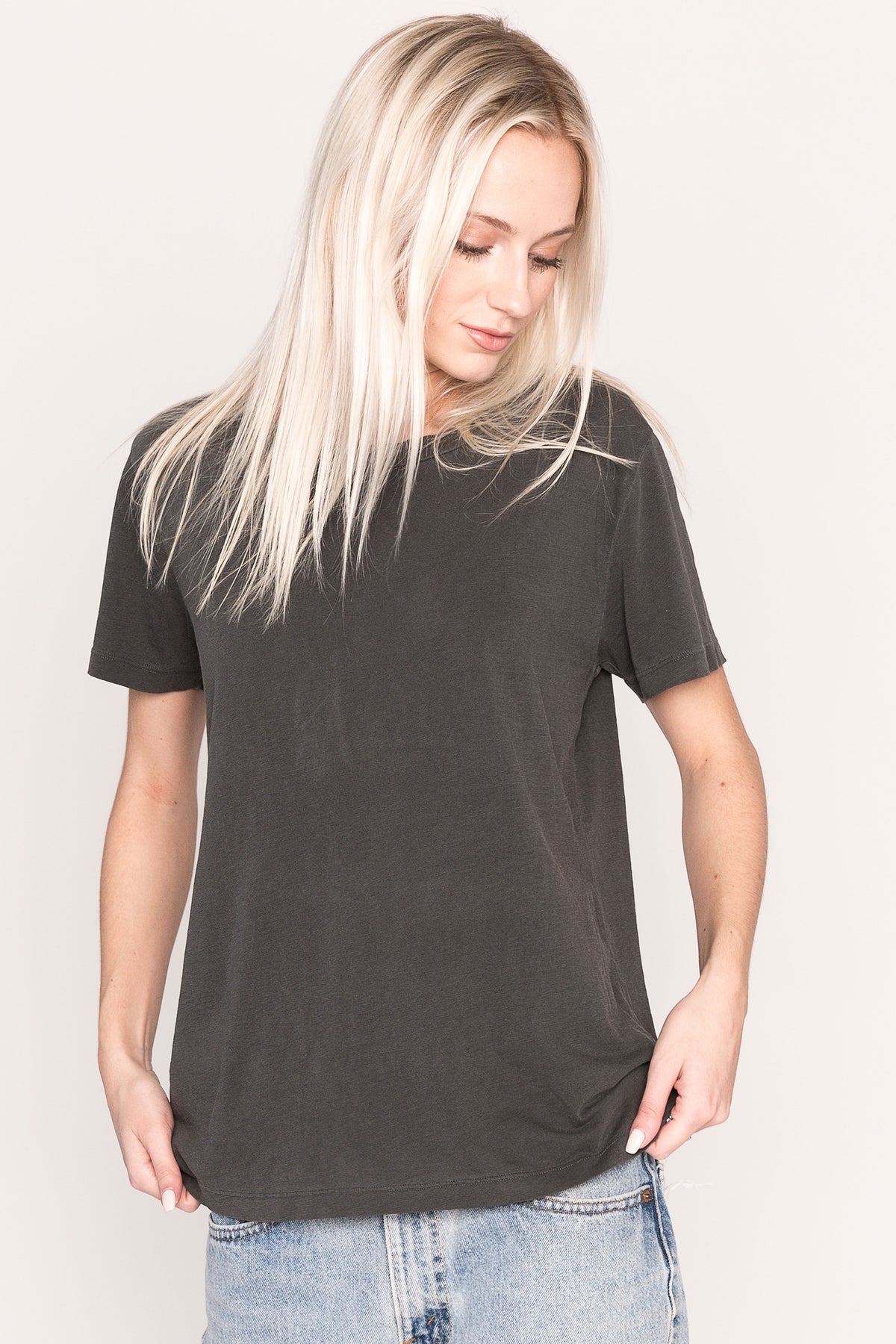 blond model wearing a garment dyed vintage black t-shirt