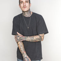 White male model with edgy style wearing a heavyweight cotton Classic Fit Crew Neck T-shirt Vintage black
